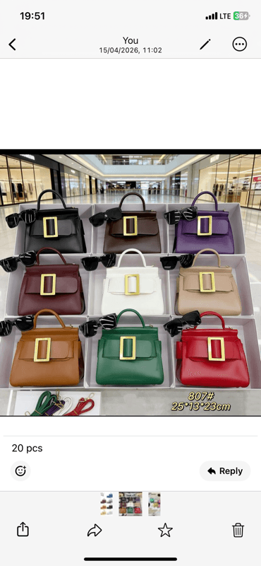 ladies hand bag with box and spectacles