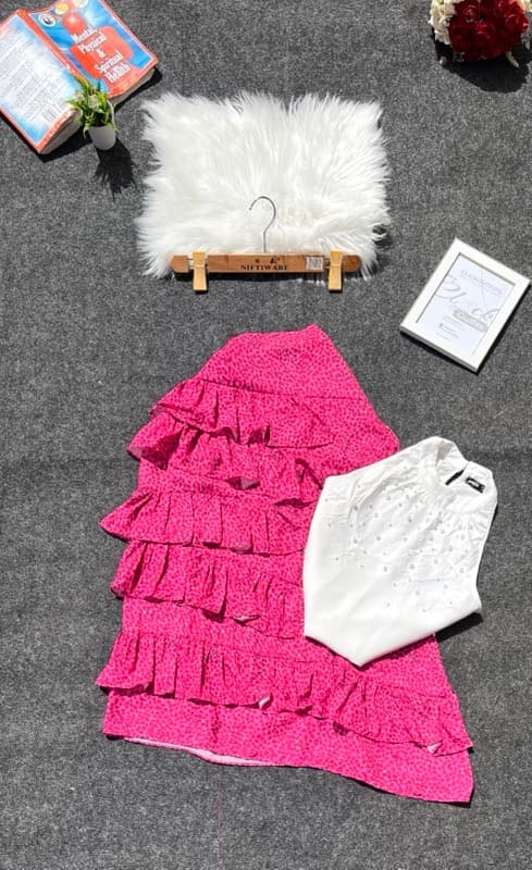 High Nect top and a Ragged Skirt