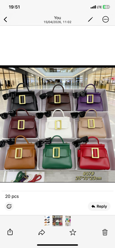 ladies hand bag with box and spectacles